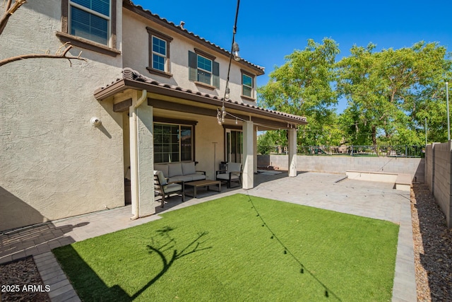 263 N Wilson Dr, Chandler, AZ 85225 - back of house featuring stucco siding, a patio, a fenced backyard, an outdoor hangout area, and a tile roof