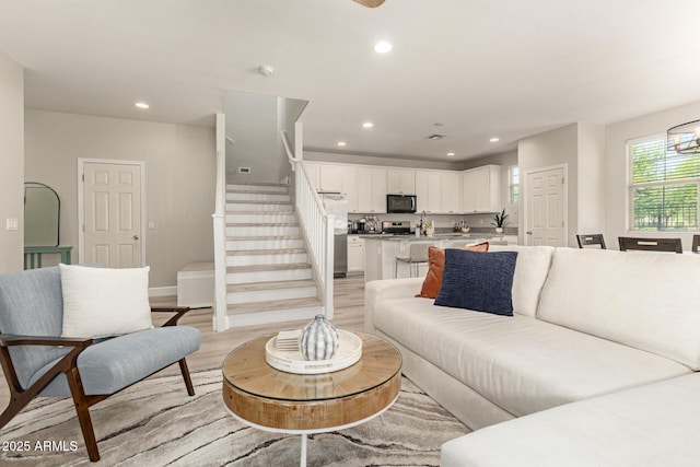 263 N Wilson Dr, Chandler, AZ 85225 - living room with stairway, recessed lighting, and light wood finished floors