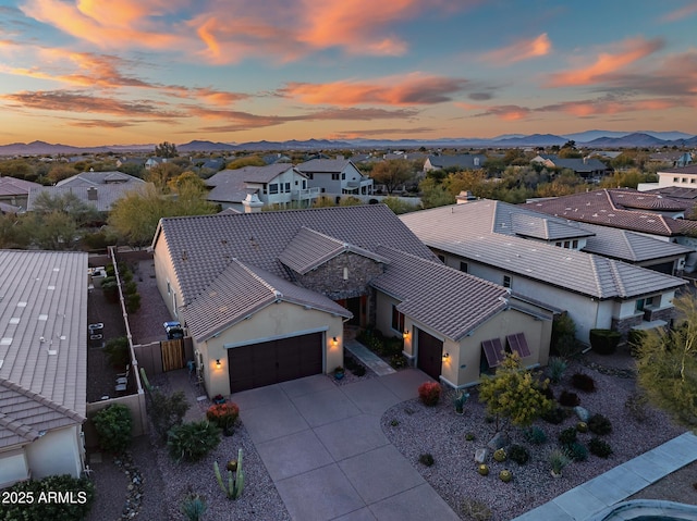 aerial view at dusk with a mountain view