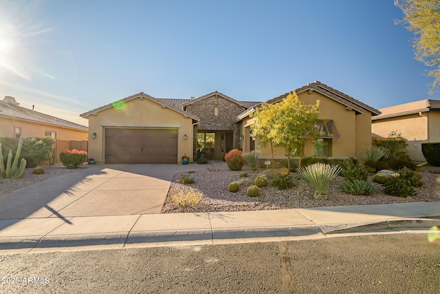 view of front of property with a garage