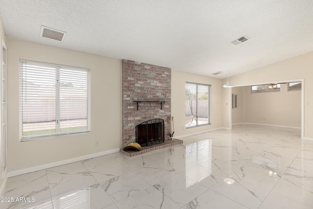 643 W Medina Ave, Mesa, AZ 85210 - unfurnished living room with marble look tile flooring, baseboards, and a brick fireplace
