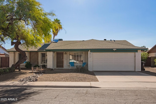 643 W Medina Ave, Mesa, AZ 85210 - ranch-style house with an attached garage, concrete driveway, stucco siding, and covered porch