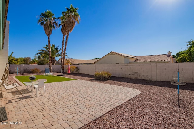 643 W Medina Ave, Mesa, AZ 85210 - fenced backyard with a patio area