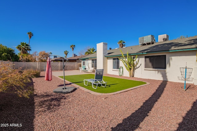 643 W Medina Ave, Mesa, AZ 85210 - fenced backyard featuring cooling unit and a patio