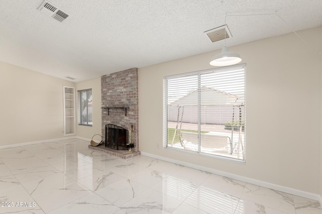 643 W Medina Ave, Mesa, AZ 85210 - unfurnished living room featuring marble look tiles, baseboards, a textured ceiling, and a brick fireplace