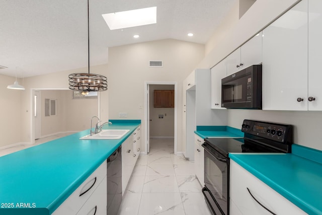 643 W Medina Ave, Mesa, AZ 85210 - kitchen featuring black appliances, a sink, lofted ceiling, a skylight, and white cabinets