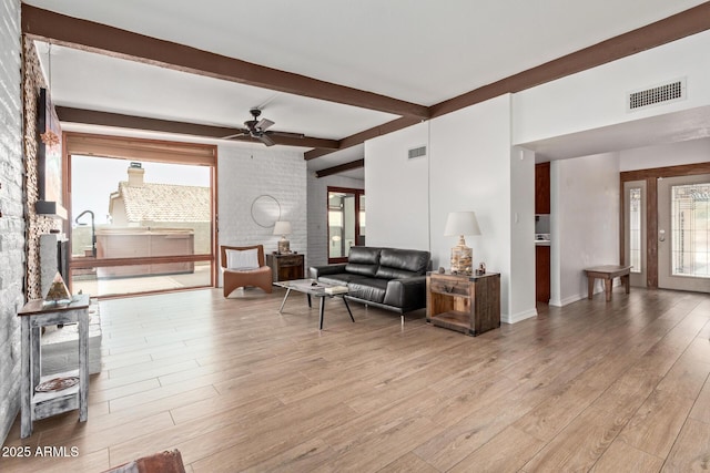 17346 E Oro Grande Dr, Fountain Hills, AZ 85268 - living area with beamed ceiling, visible vents, light wood-style floors, and ceiling fan