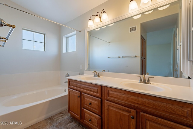 2421 W Indigo Dr, Chandler, AZ 85248 - bathroom with a garden tub and double vanity