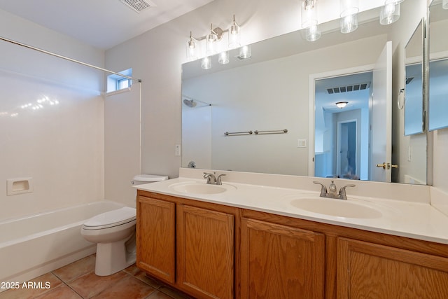 2421 W Indigo Dr, Chandler, AZ 85248 - full bathroom featuring tile patterned floors, double vanity, bathtub / shower combination, and toilet