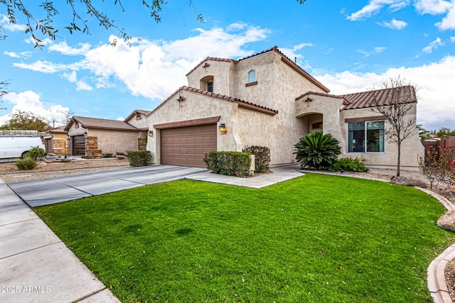 mediterranean / spanish house featuring a garage and a front yard