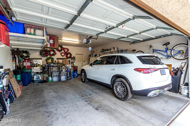 garage featuring a garage door opener