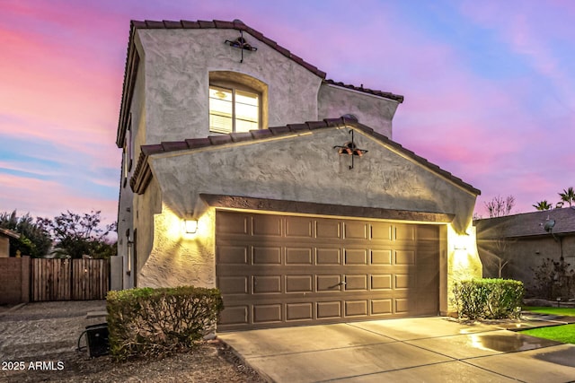 view of front of home with a garage