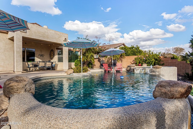 view of swimming pool featuring a patio