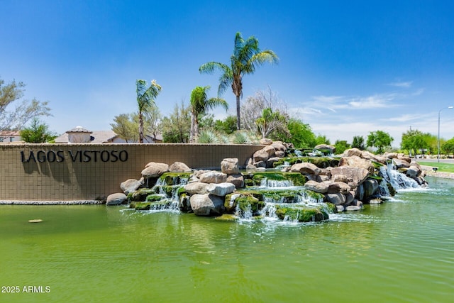 exterior space with a water view