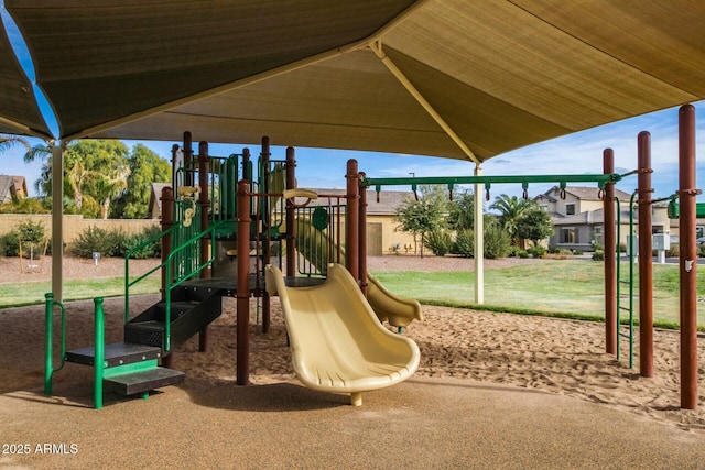 view of jungle gym with a lawn