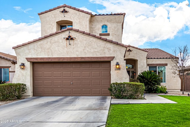 mediterranean / spanish-style house with a garage and a front lawn