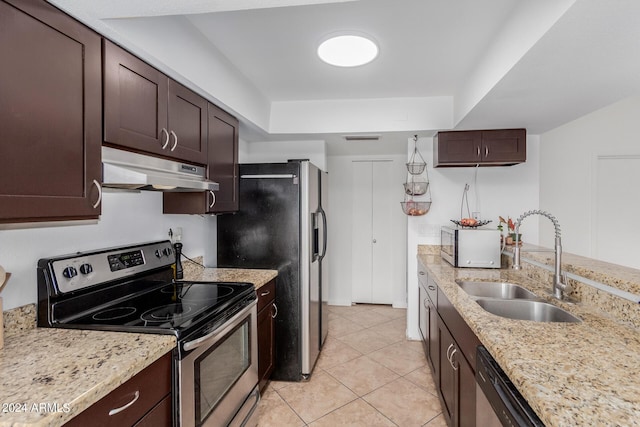 3837 W Dailey St, Phoenix, AZ 85053 - kitchen with a sink, stainless steel appliances, visible vents, under cabinet range hood, and dark brown cabinetry