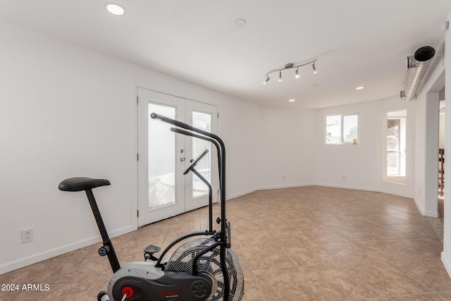 3837 W Dailey St, Phoenix, AZ 85053 - exercise room with baseboards, light tile patterned floors, and recessed lighting