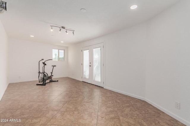 3837 W Dailey St, Phoenix, AZ 85053 - exercise area with light tile patterned flooring, baseboards, and recessed lighting