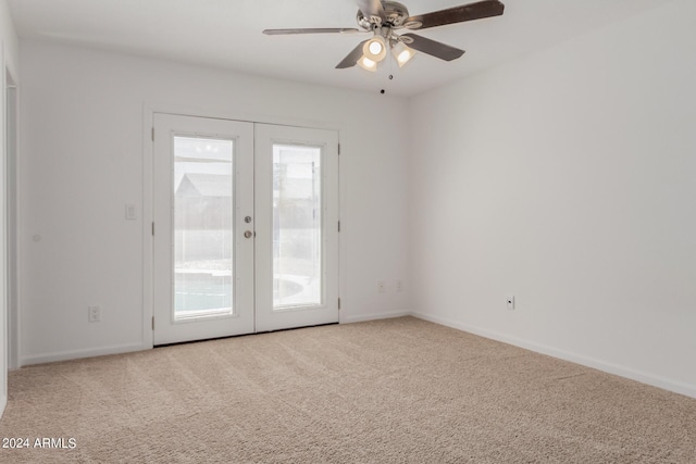 3837 W Dailey St, Phoenix, AZ 85053 - carpeted spare room featuring a ceiling fan, baseboards, a healthy amount of sunlight, and french doors
