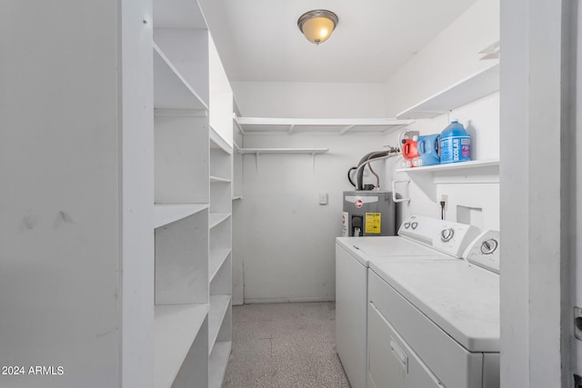 3837 W Dailey St, Phoenix, AZ 85053 - clothes washing area featuring light colored carpet, washing machine and clothes dryer, water heater, and laundry area