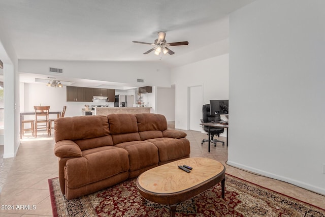 3837 W Dailey St, Phoenix, AZ 85053 - living room with vaulted ceiling, a ceiling fan, light tile patterned floors, and visible vents