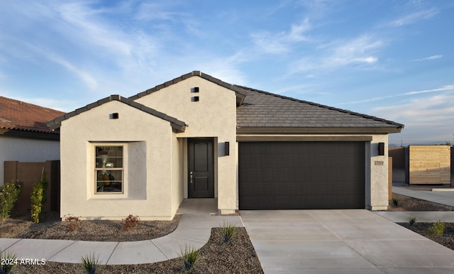 view of front of property with a garage