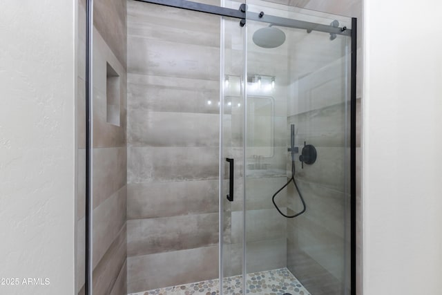 bathroom featuring an enclosed shower