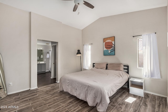 bedroom with connected bathroom, vaulted ceiling, ceiling fan, and dark wood-type flooring