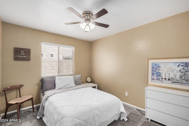 bedroom with ceiling fan and carpet floors