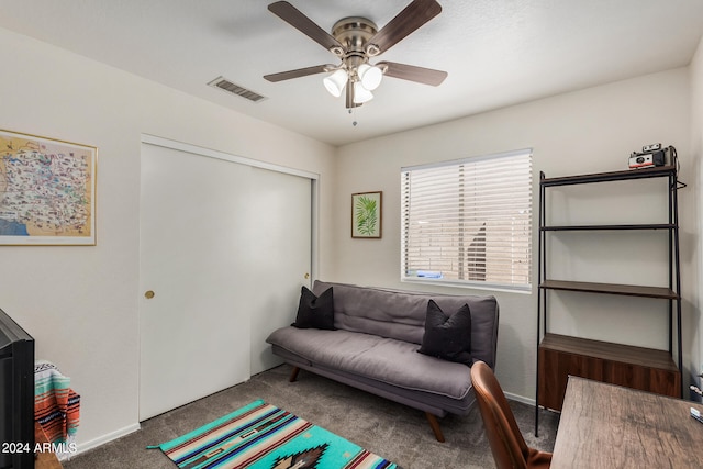 game room with carpet and ceiling fan