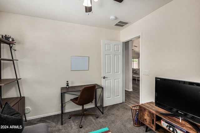 carpeted home office with ceiling fan