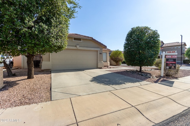 view of front of home featuring a garage