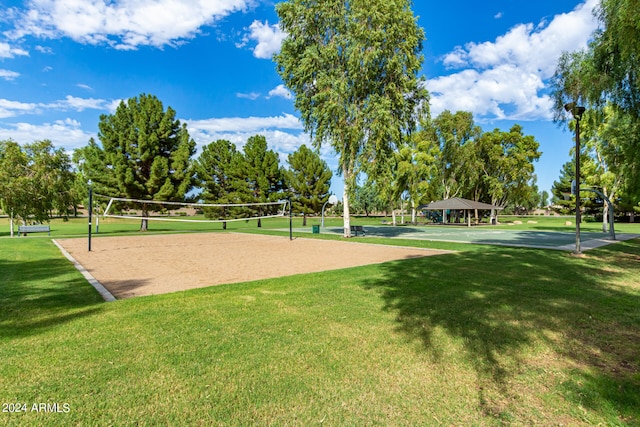 view of property's community featuring a gazebo, a yard, and volleyball court