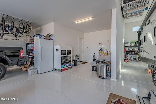 garage with white refrigerator