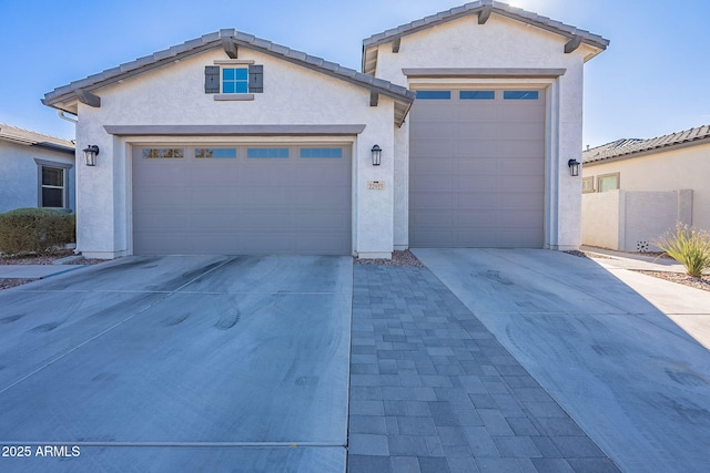 view of front of property with a garage