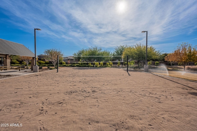 view of property's community featuring volleyball court