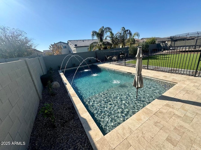 view of swimming pool with pool water feature