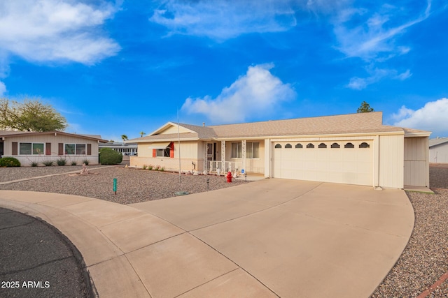 single story home featuring driveway and an attached garage