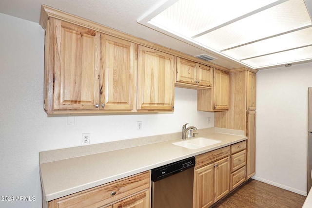 kitchen with light brown cabinets, dark wood-type flooring, sink, and stainless steel dishwasher