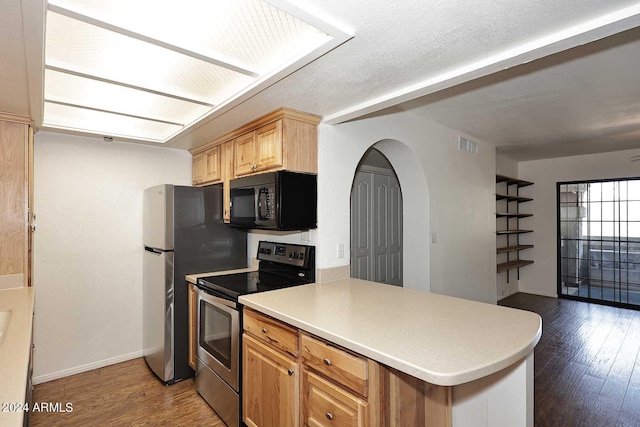 kitchen featuring kitchen peninsula, stainless steel range with electric stovetop, and dark hardwood / wood-style floors