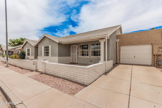 2929 E Broadway Rd Unit 30, Mesa, AZ 85204 - single story home featuring stucco siding, concrete driveway, and a garage
