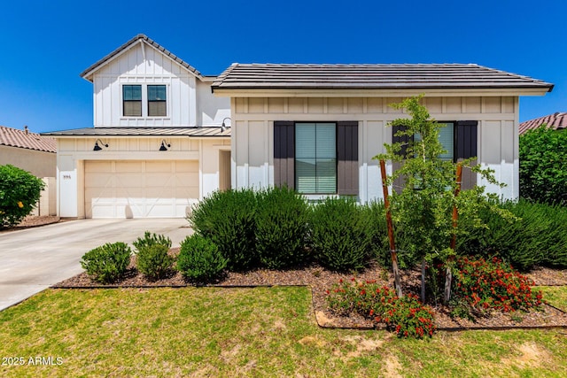 3914 W Serpentine Dr, San Tan Valley, AZ 85144 - view of front of home with board and batten siding, a standing seam roof, metal roof, a garage, and concrete driveway