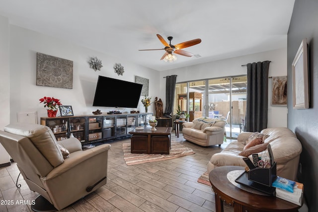 living room featuring ceiling fan