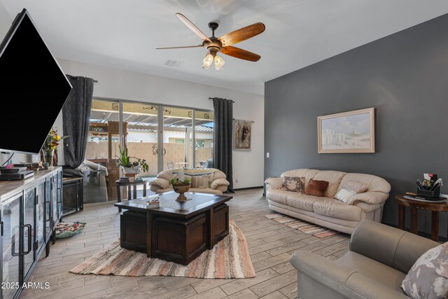 living room with ceiling fan