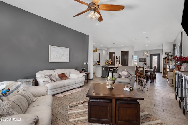 living room featuring ceiling fan