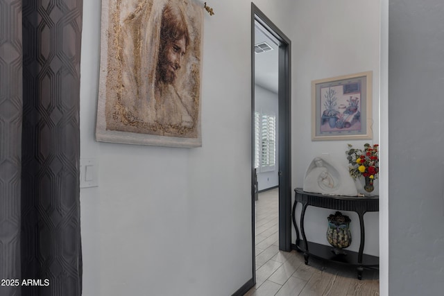 hallway featuring light wood-type flooring