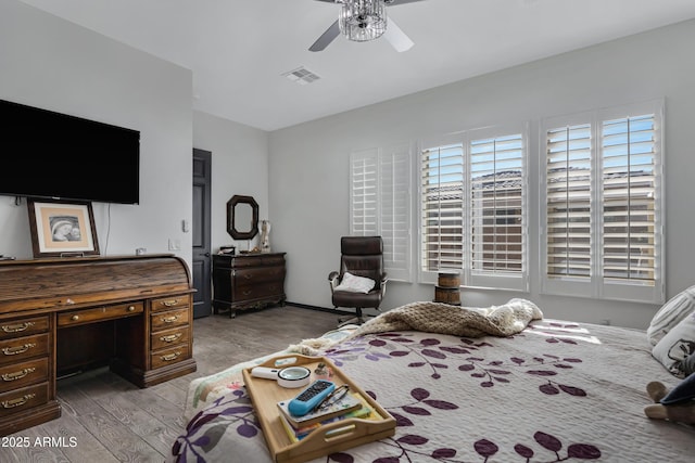 bedroom featuring ceiling fan and light hardwood / wood-style flooring