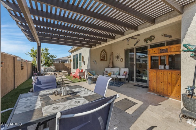 view of patio / terrace with an outdoor living space and a pergola