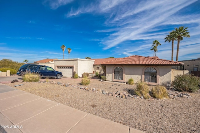 1908 E Beck Ln, Phoenix, AZ 85022 - view of front of house featuring stucco siding, a garage, and a tile roof